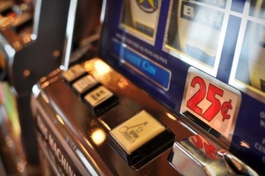 Fa Cai Shen Deluxe slot interface showing prosperity symbols and bonus features on mobile